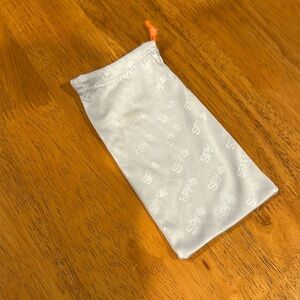 SPY glasses sleeve. Silver. Has orange cinch rope. 4x7. Inside is same as outer